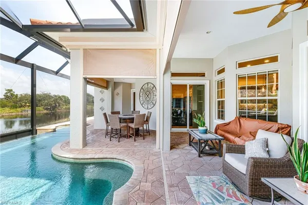 a view of swimming pool from a lake view