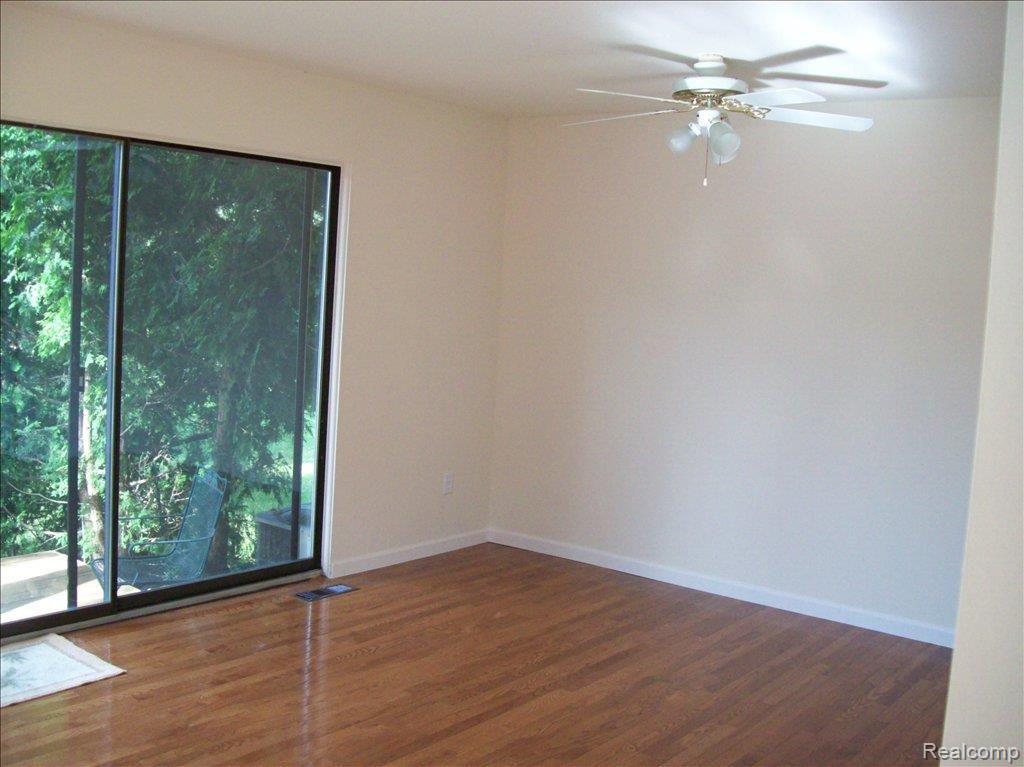 661 Oakbrook West, Unit 10 Rochester, MI 48307 - Photo 10 of 20 NEW ASH WOOD FLOORING