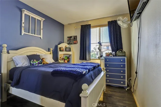 a bathroom with a sink a toilet a shower and a mirror