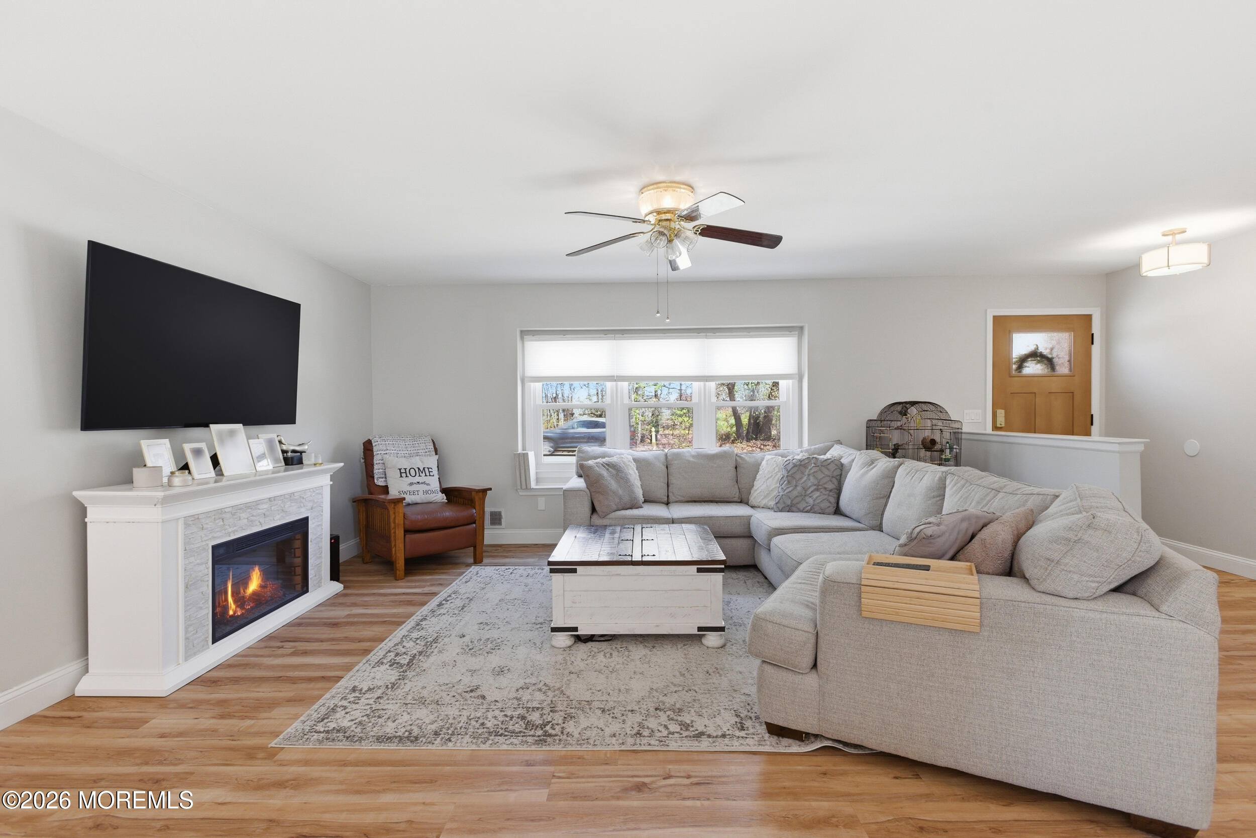 1635 Burrsville Road Brick, NJ 08724 - Photo 11 of 64 a living room with furniture and a flat screen tv