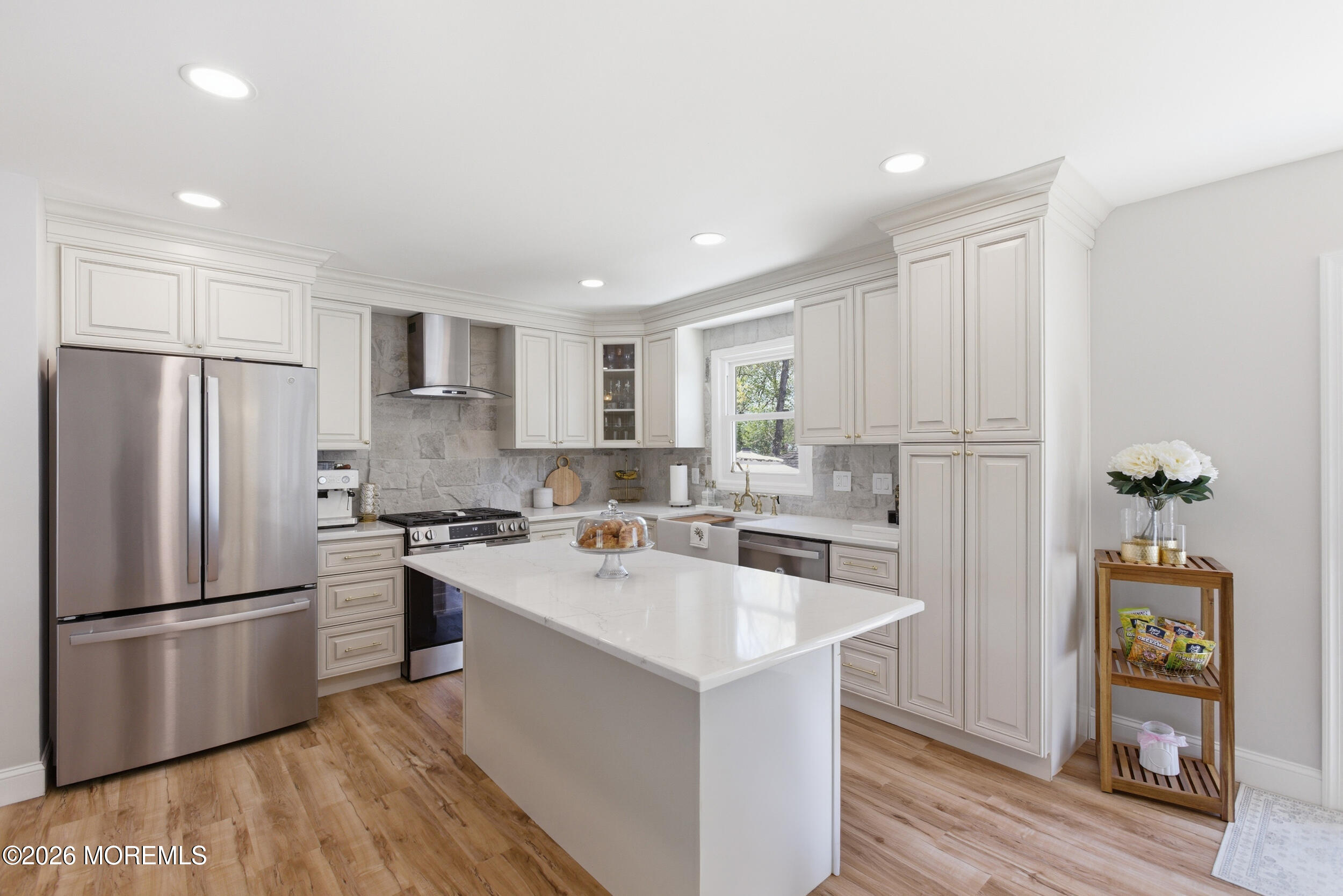 1635 Burrsville Road Brick, NJ 08724 - Photo 15 of 64 a kitchen with a refrigerator a sink and a stove top oven