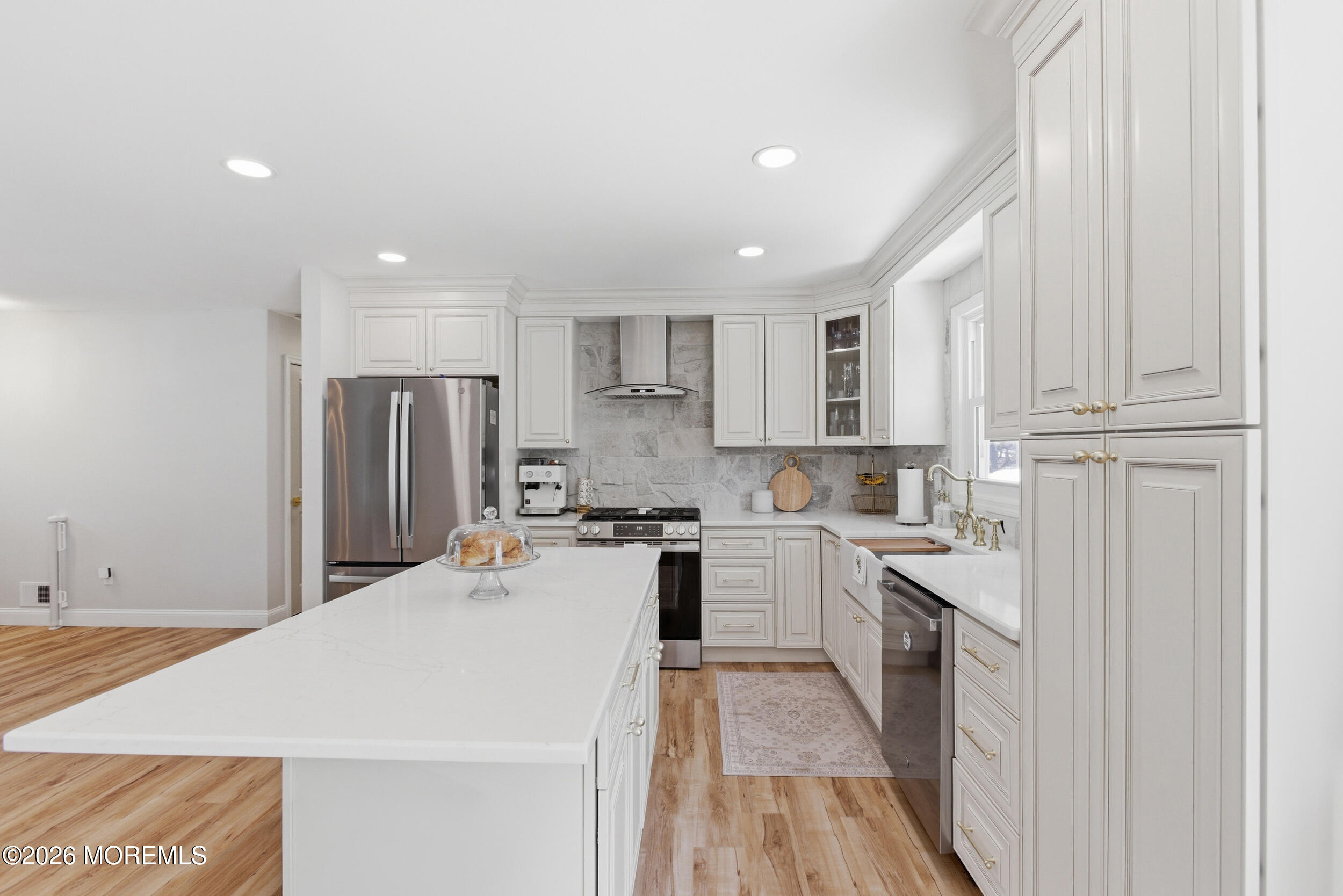 1635 Burrsville Road Brick, NJ 08724 - Photo 20 of 64 a kitchen with stainless steel appliances a refrigerator a stove top oven and white cabinets