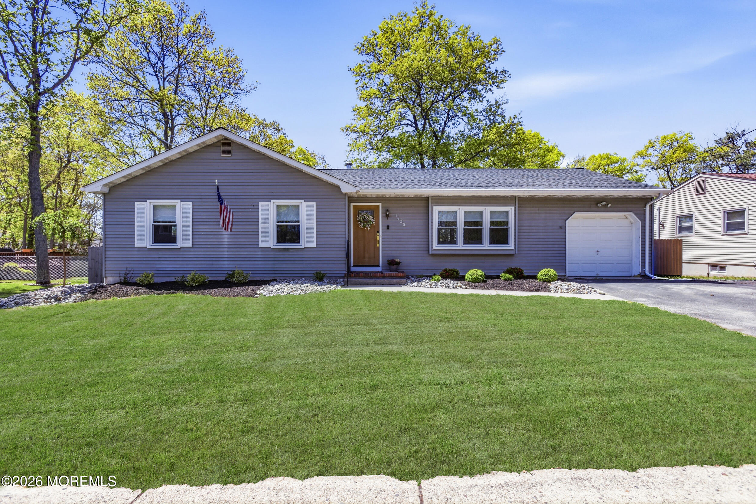 1635 Burrsville Road Brick, NJ 08724 - Photo 2 of 64 a front view of house with yard and green space