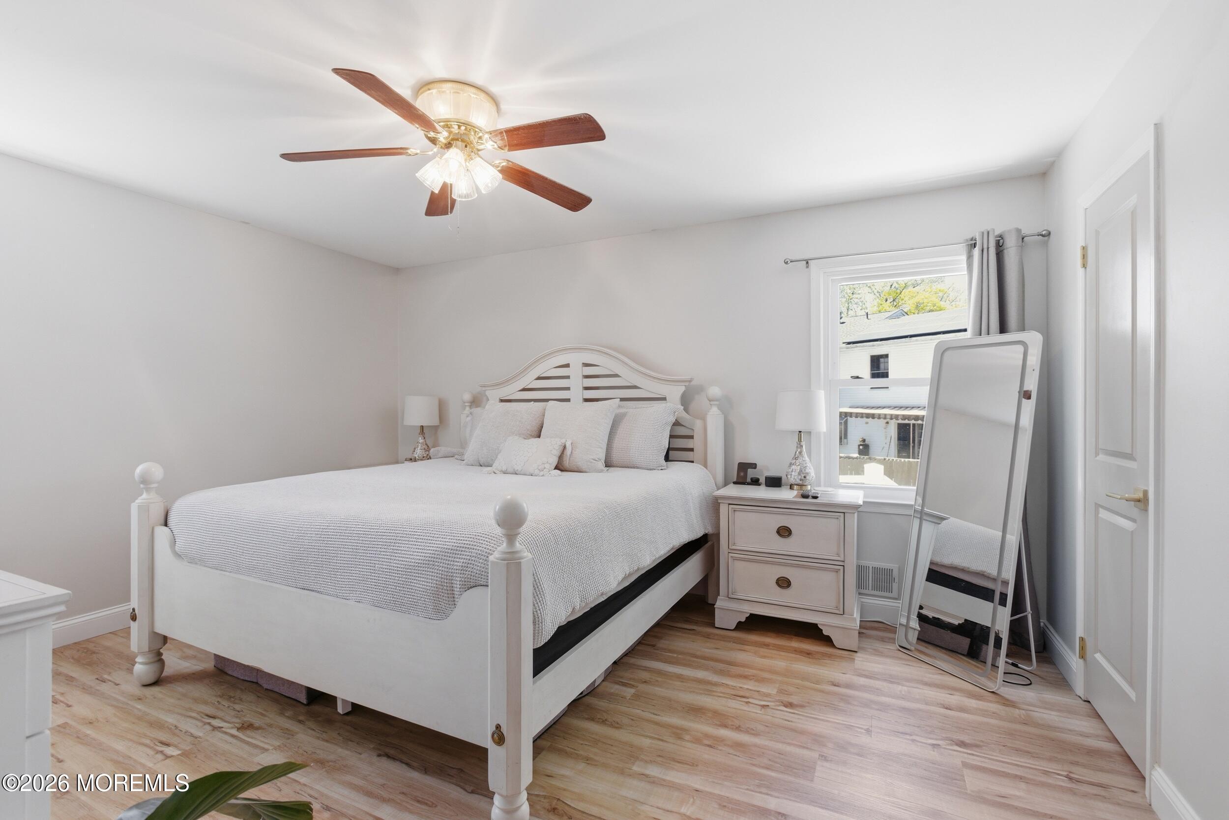 1635 Burrsville Road Brick, NJ 08724 - Photo 23 of 64 a bedroom with a bed and a window