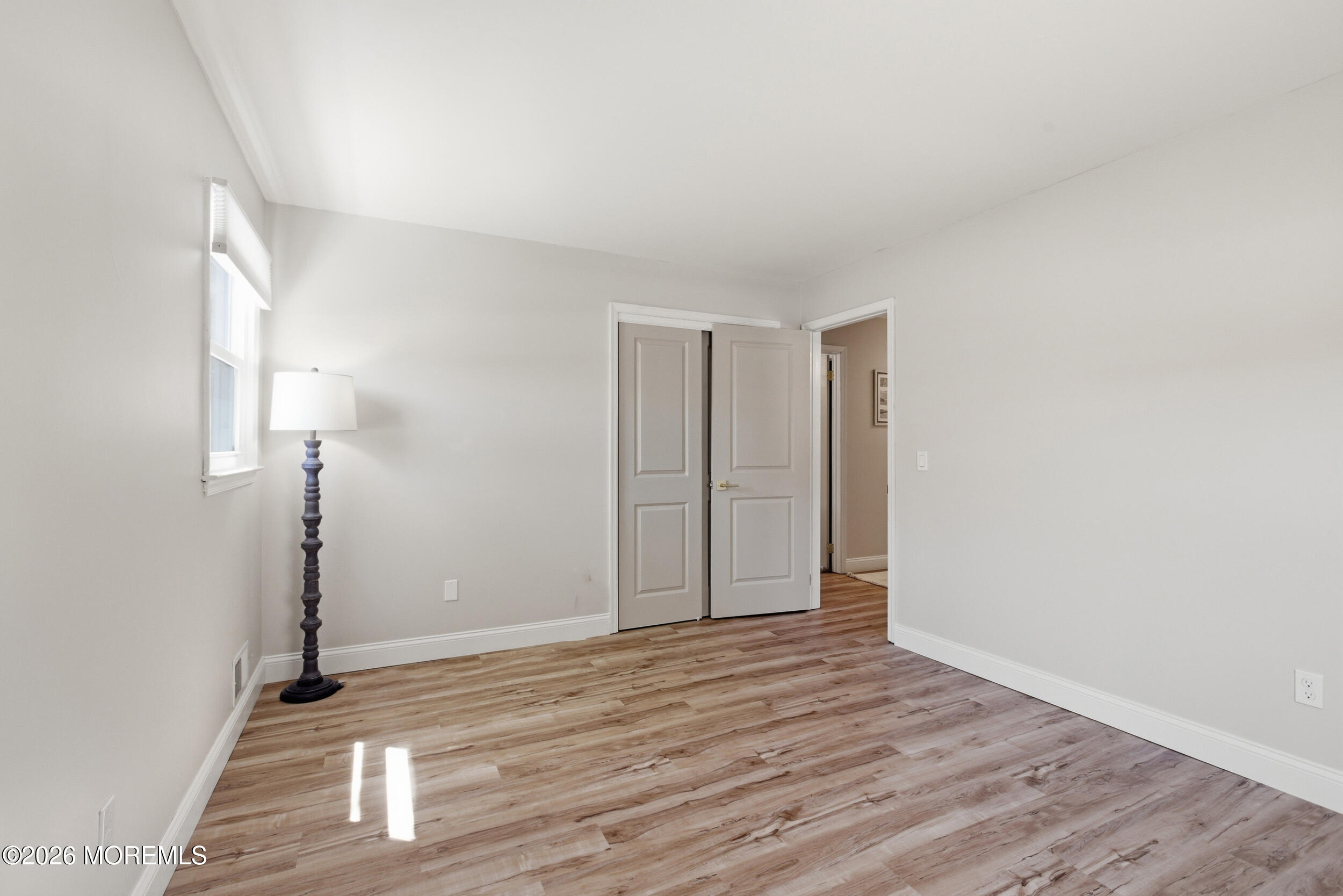 1635 Burrsville Road Brick, NJ 08724 - Photo 29 of 64 a view of empty room with wooden floor