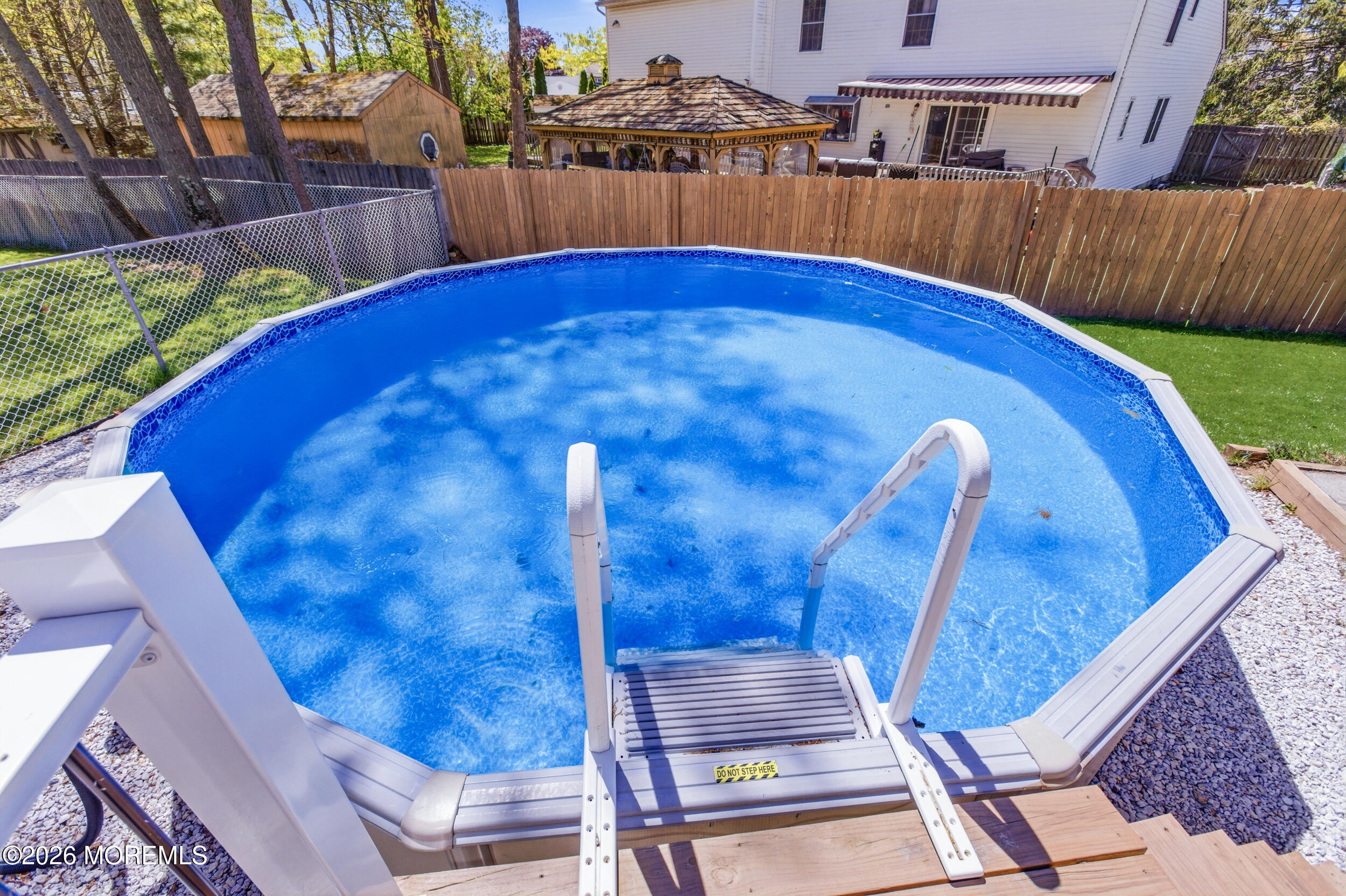1635 Burrsville Road Brick, NJ 08724 - Photo 40 of 64 a view of an outdoor space and a swimming pool
