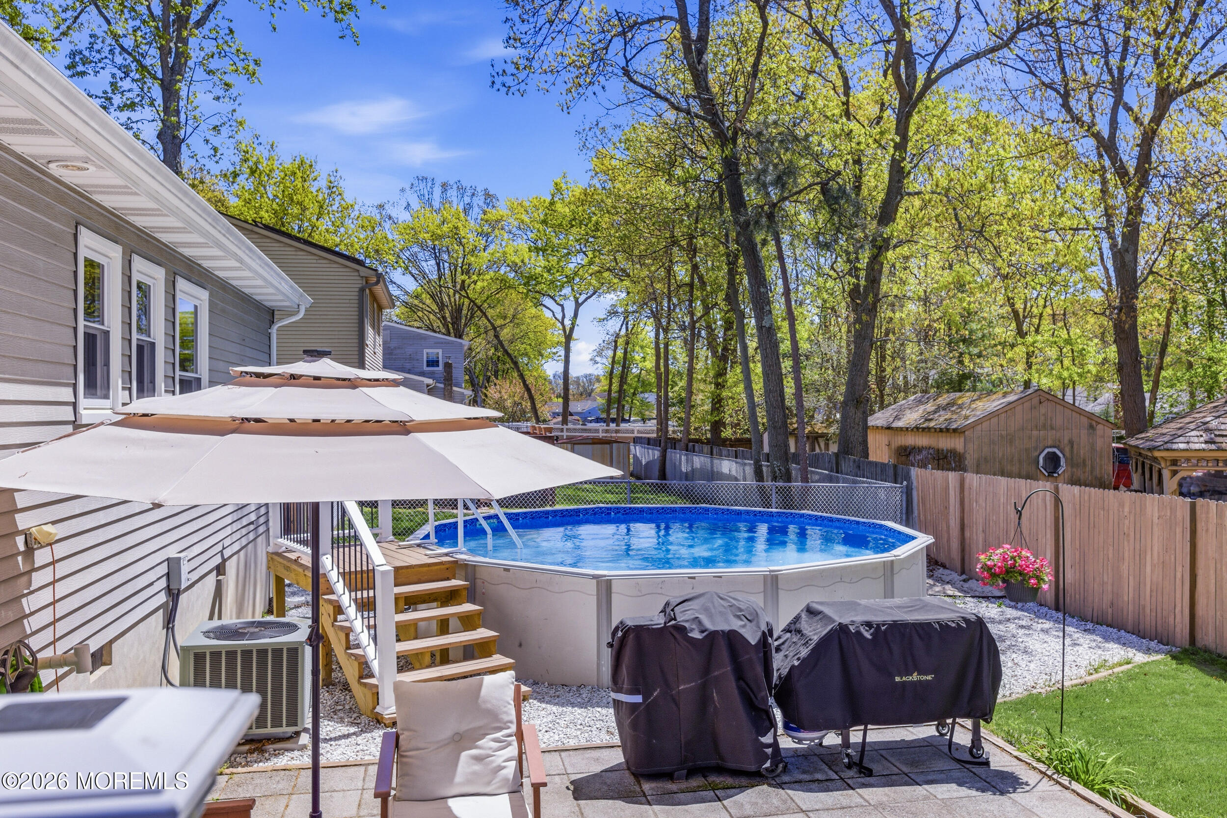 1635 Burrsville Road Brick, NJ 08724 - Photo 42 of 64 a view of a patio with swimming pool