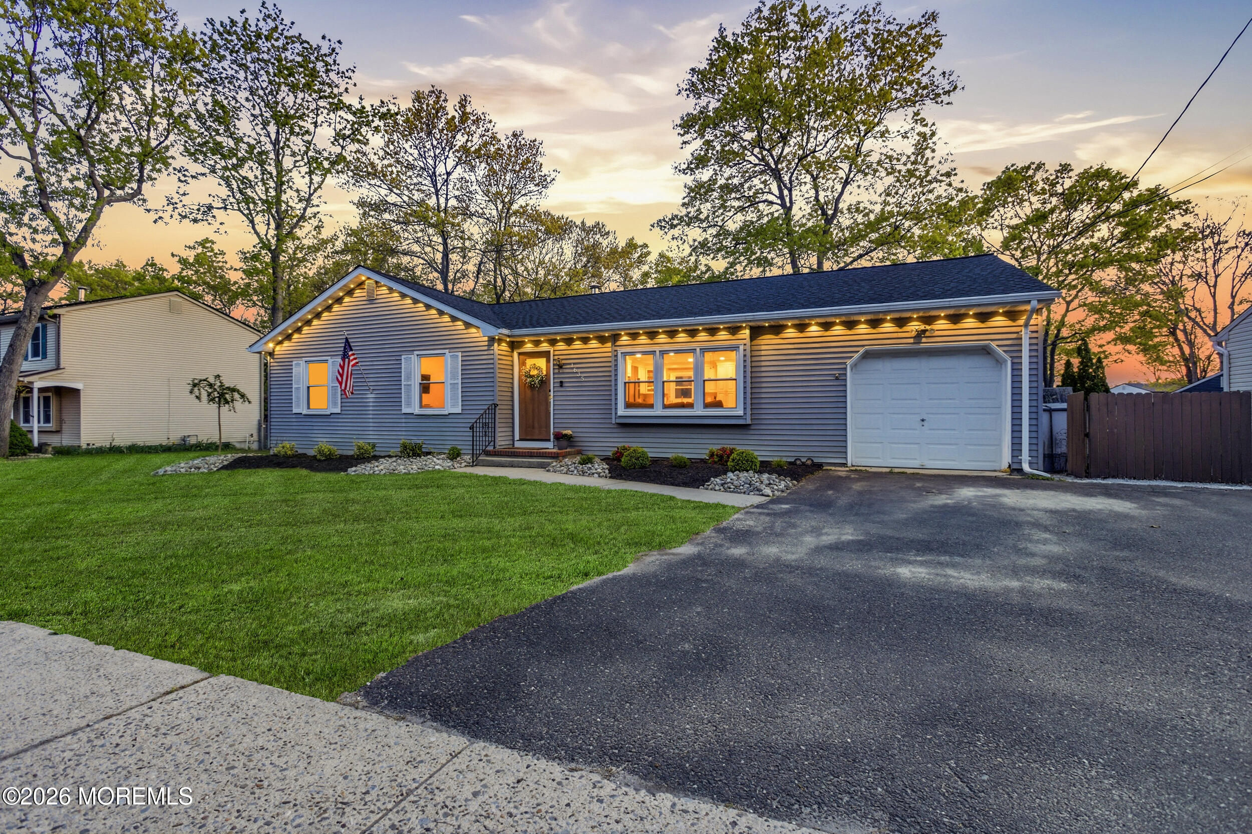 1635 Burrsville Road Brick, NJ 08724 - Photo 43 of 64 a front view of a house with a garden and yard