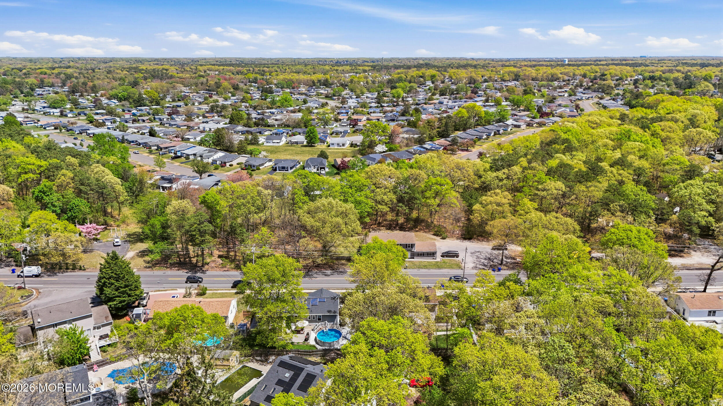 1635 Burrsville Road Brick, NJ 08724 - Photo 58 of 64 an aerial view of residential houses with outdoor space and trees