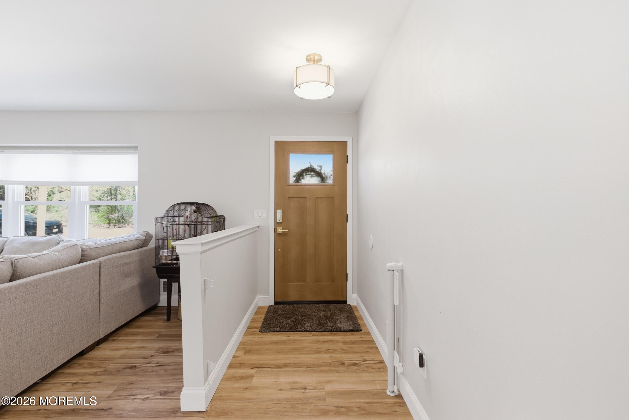 1635 Burrsville Road Brick, NJ 08724 - Photo 6 of 64 a view of a hallway with windows