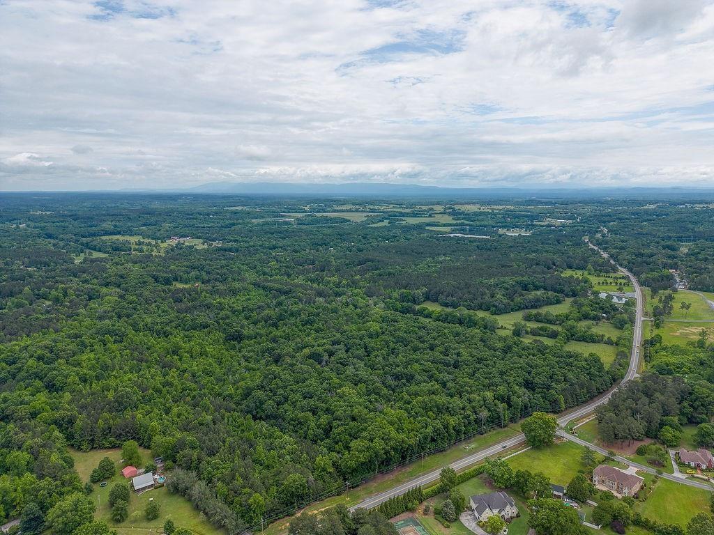 2148 Red Bud Road Northeast Calhoun, GA 30701 - Photo 11 of 18 a view of a city with lush green forest