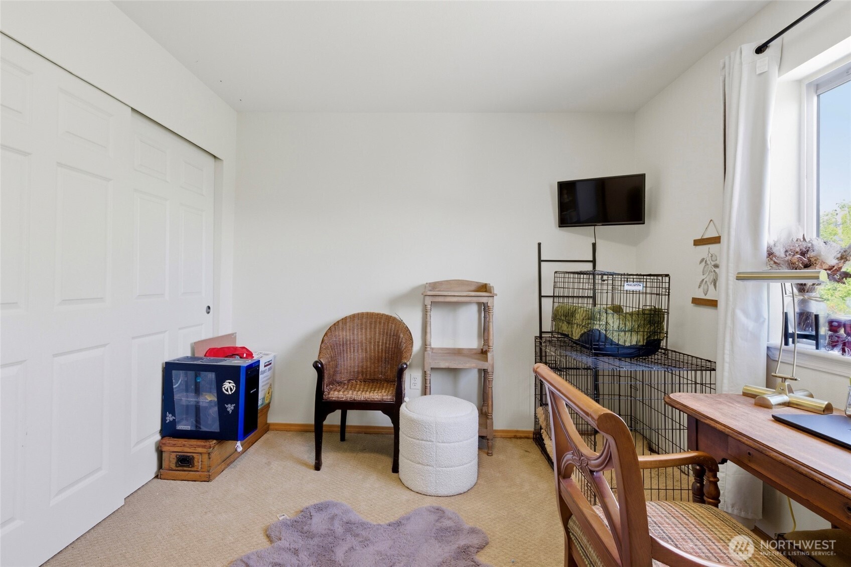 14005 Cedar Court Sultan, WA 98294 - Photo 21 of 38 a living room with furniture and a flat screen tv