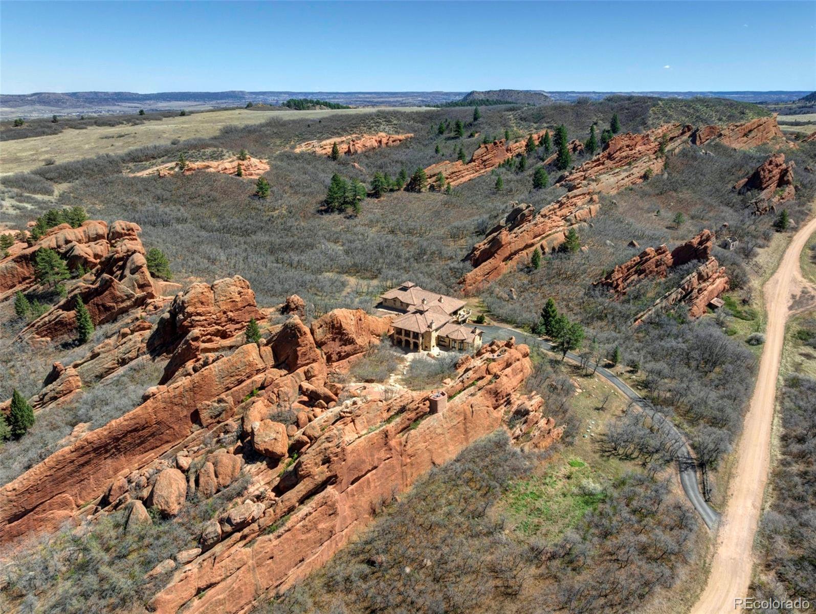3755 North Rampart Range Road Littleton, CO 80125 - Photo 49 of 50 an aerial view of beach and ocean