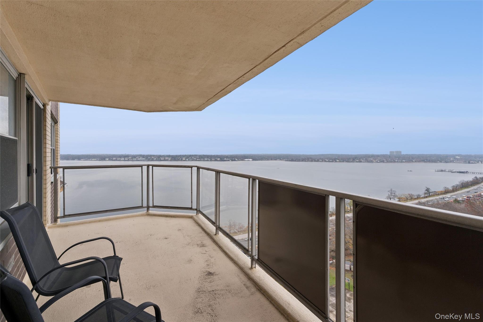 17-85 215th Street, Unit 15M Queens, NY 11360 - Photo 12 of 30 a view of an ocean and mountain view