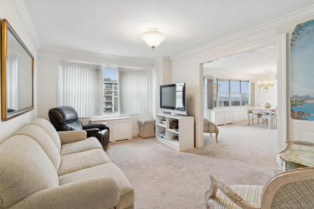 a bathroom with a toilet a sink and a mirror