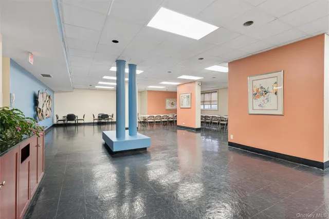 a kitchen with a sink and a stove top oven