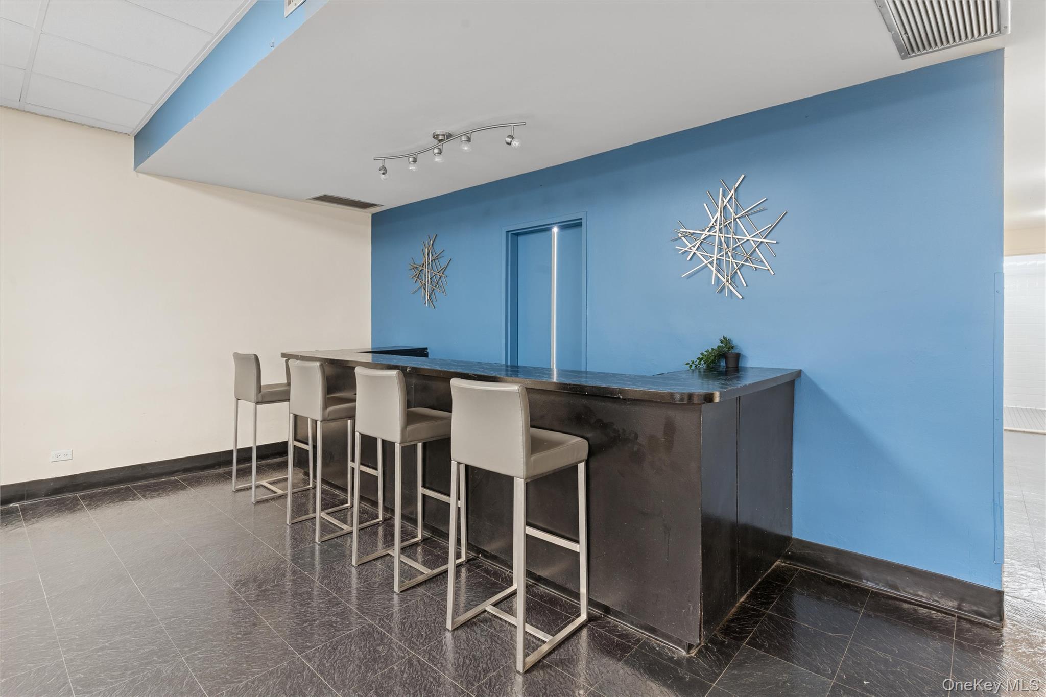 17-85 215th Street, Unit 15M Queens, NY 11360 - Photo 24 of 30 a view of a dining room with furniture