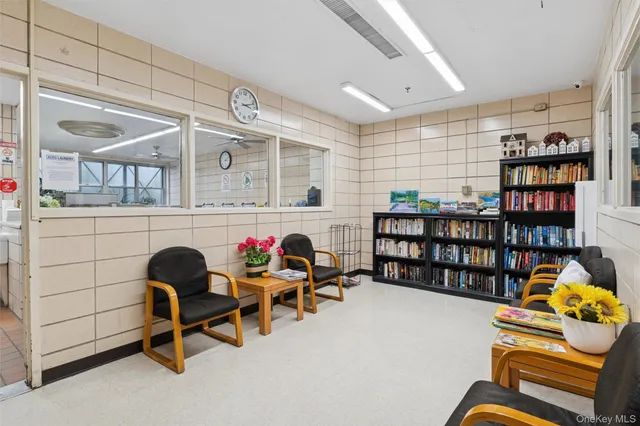 a view of a hallway with dining area