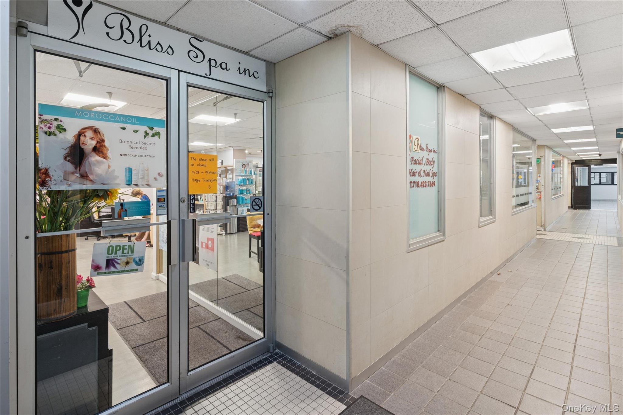 17-85 215th Street, Unit 15M Queens, NY 11360 - Photo 28 of 30 a view of a hallway with dining area