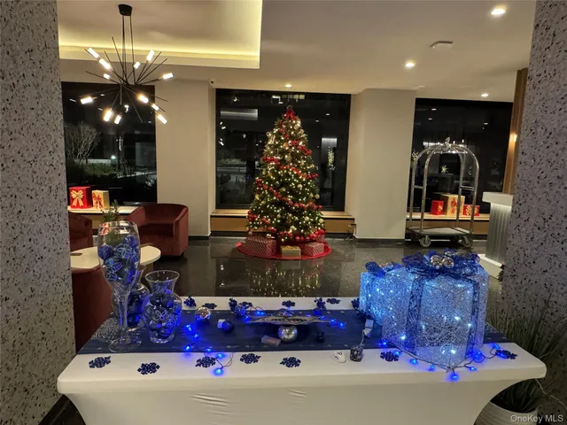 a living room with furniture and a table