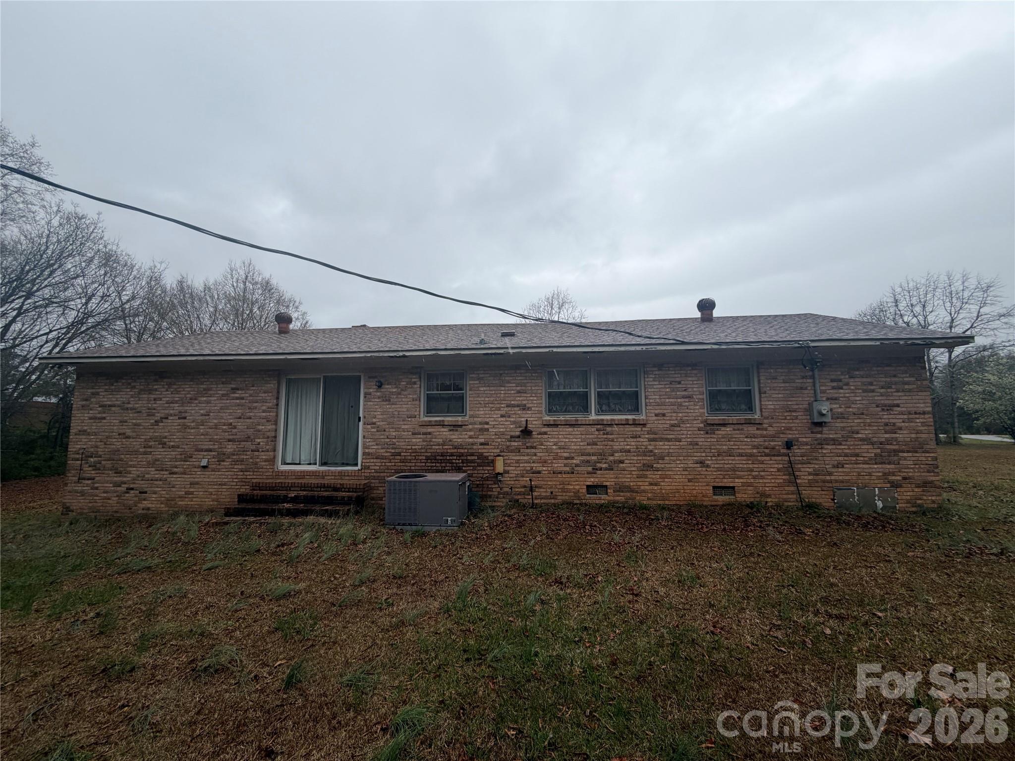 2990 Flat Creek Road Lancaster, SC 29720 - Photo 13 of 13 a view of a back yard of the house