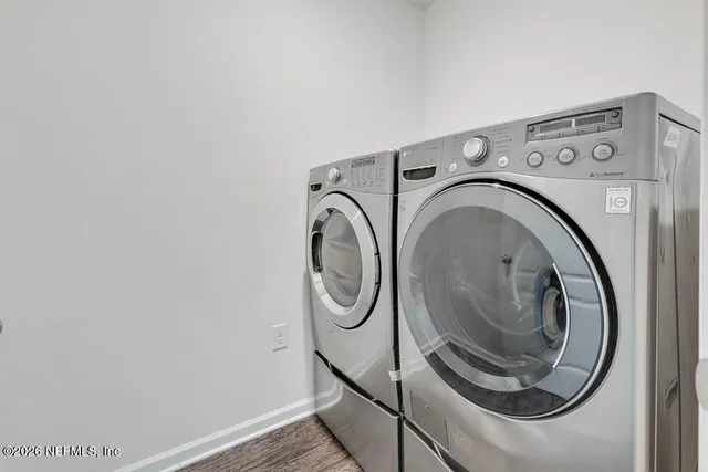 a utility room with dryer and washer