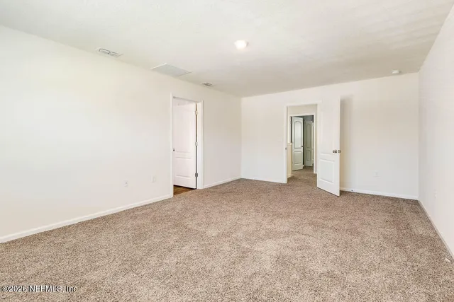 an empty room with an entryway