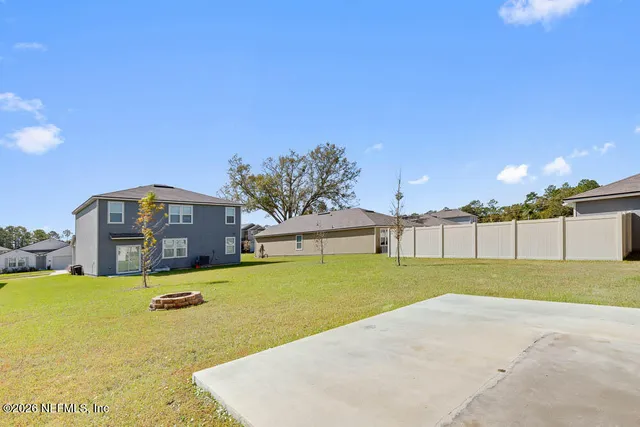 a house with swimming pool in front of it