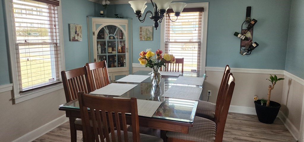 16 Abbott Street Springfield, MA 01118 - Photo 11 of 24 a view of a dining room with furniture window and wooden floor