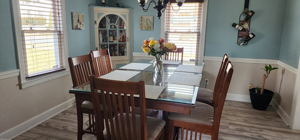 16 Abbott Street Springfield, MA 01118 - Photo 12 of 24 a view of a dining room with furniture and wooden floor