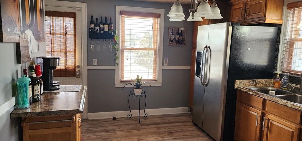 16 Abbott Street Springfield, MA 01118 - Photo 13 of 24 a kitchen with stainless steel appliances granite countertop a refrigerator and a sink