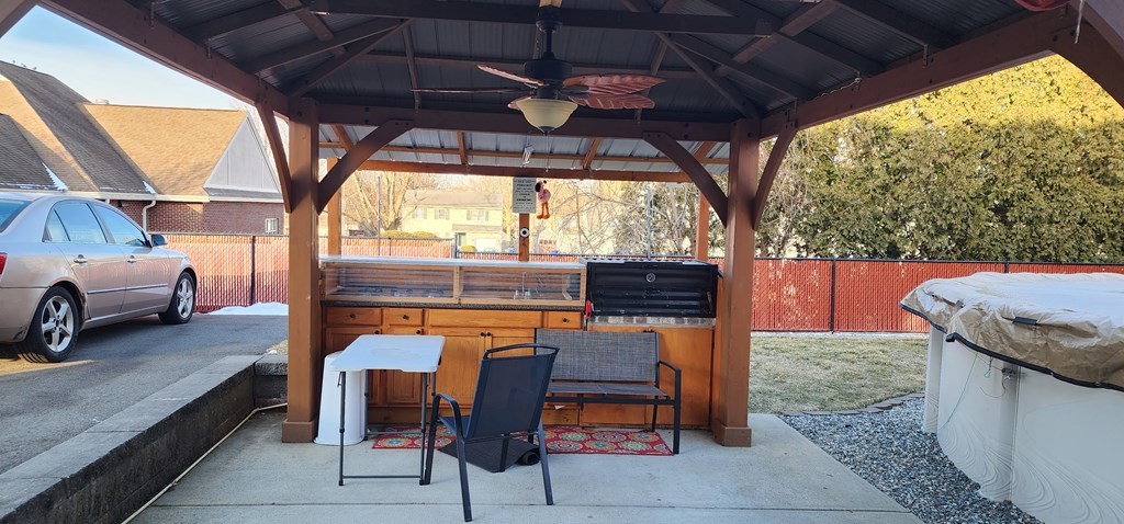 16 Abbott Street Springfield, MA 01118 - Photo 5 of 24 a patio view with a table and chairs