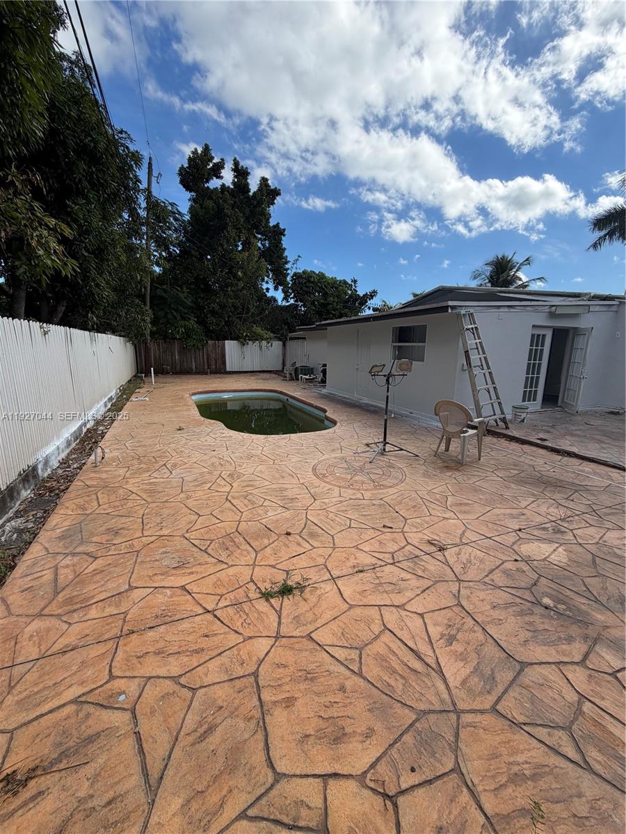 12455 Southwest 185th Terrace Miami, FL 33177 - Photo 15 of 18 a view of a backyard