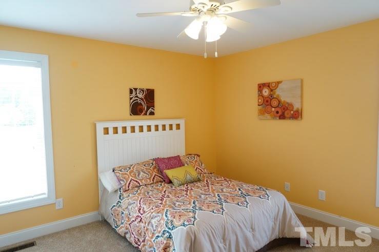 6972 Rock Ridge Sims Road Sims, NC 27880 - Photo 13 of 21 Right rear bedroom is spacious and offer a double closet.