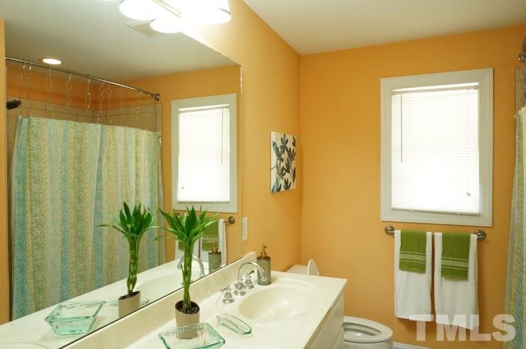 6972 Rock Ridge Sims Road Sims, NC 27880 - Photo 16 of 21 Large Double Vanity -tiled floors and large walk in shower.