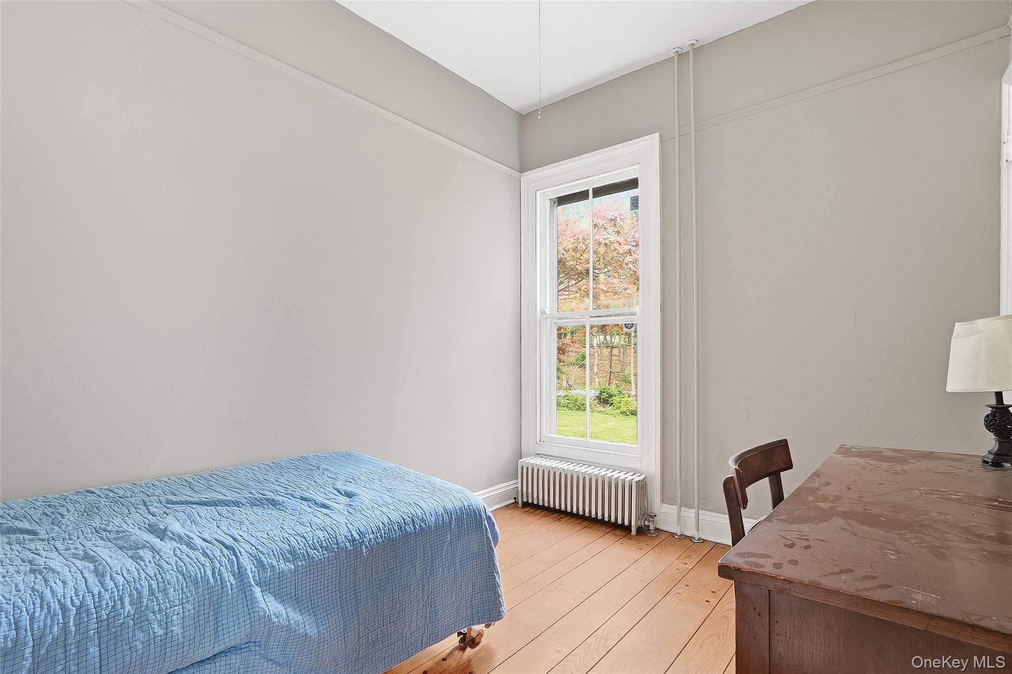 15 Ladentown Road Pomona, NY 10970 - Photo 12 of 23 a bedroom with a bed and a window