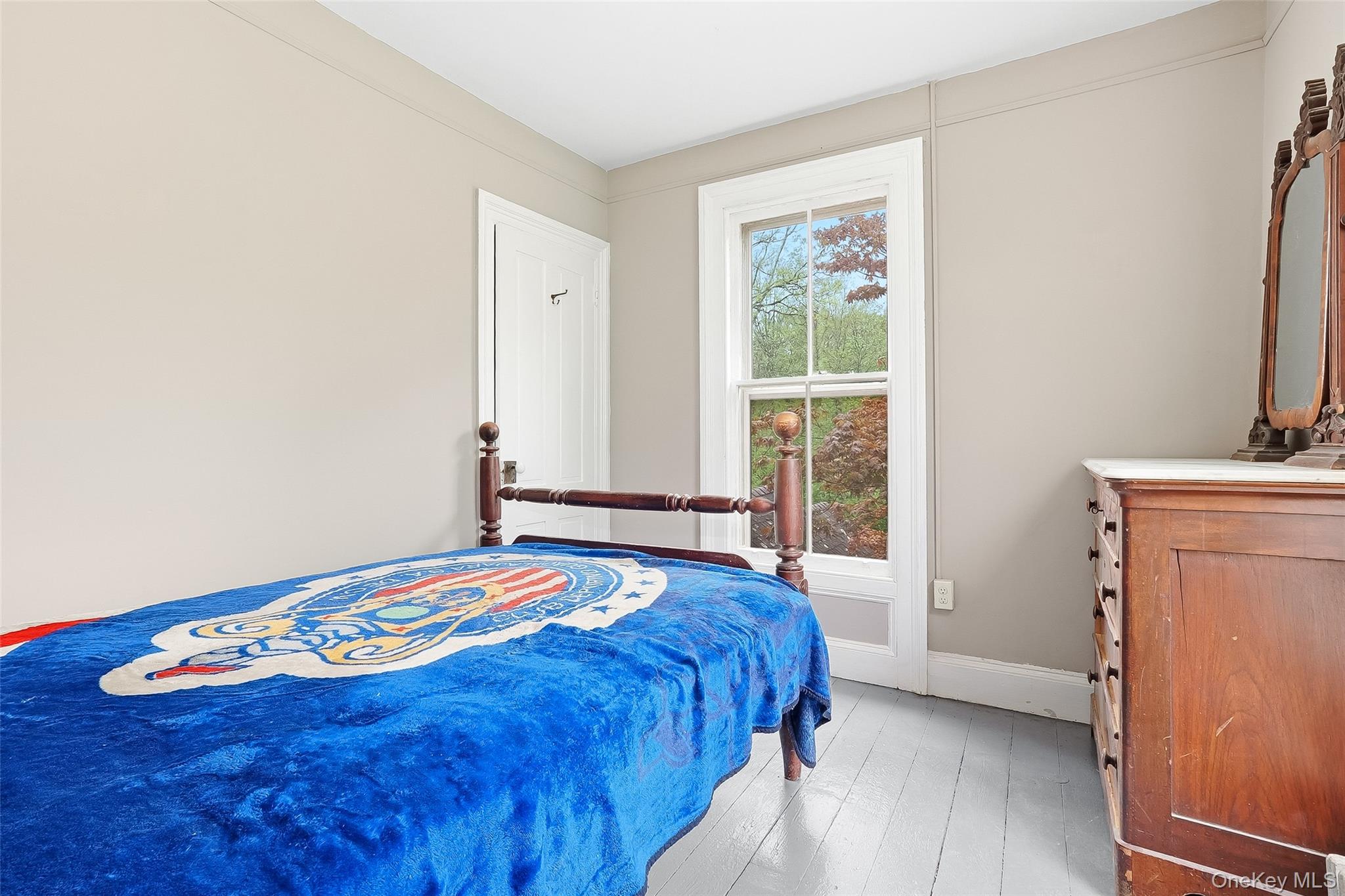 15 Ladentown Road Pomona, NY 10970 - Photo 14 of 23 a bedroom with a bed and a window