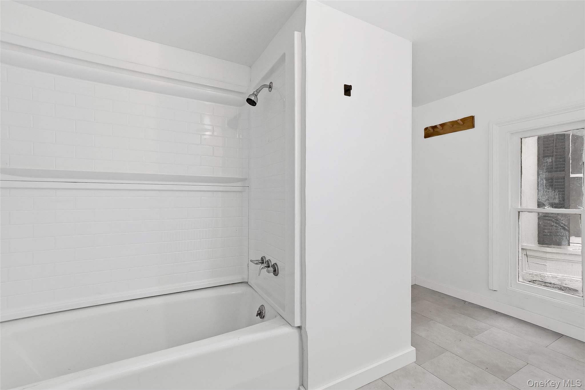 15 Ladentown Road Pomona, NY 10970 - Photo 18 of 23 a bathroom with a bathtub