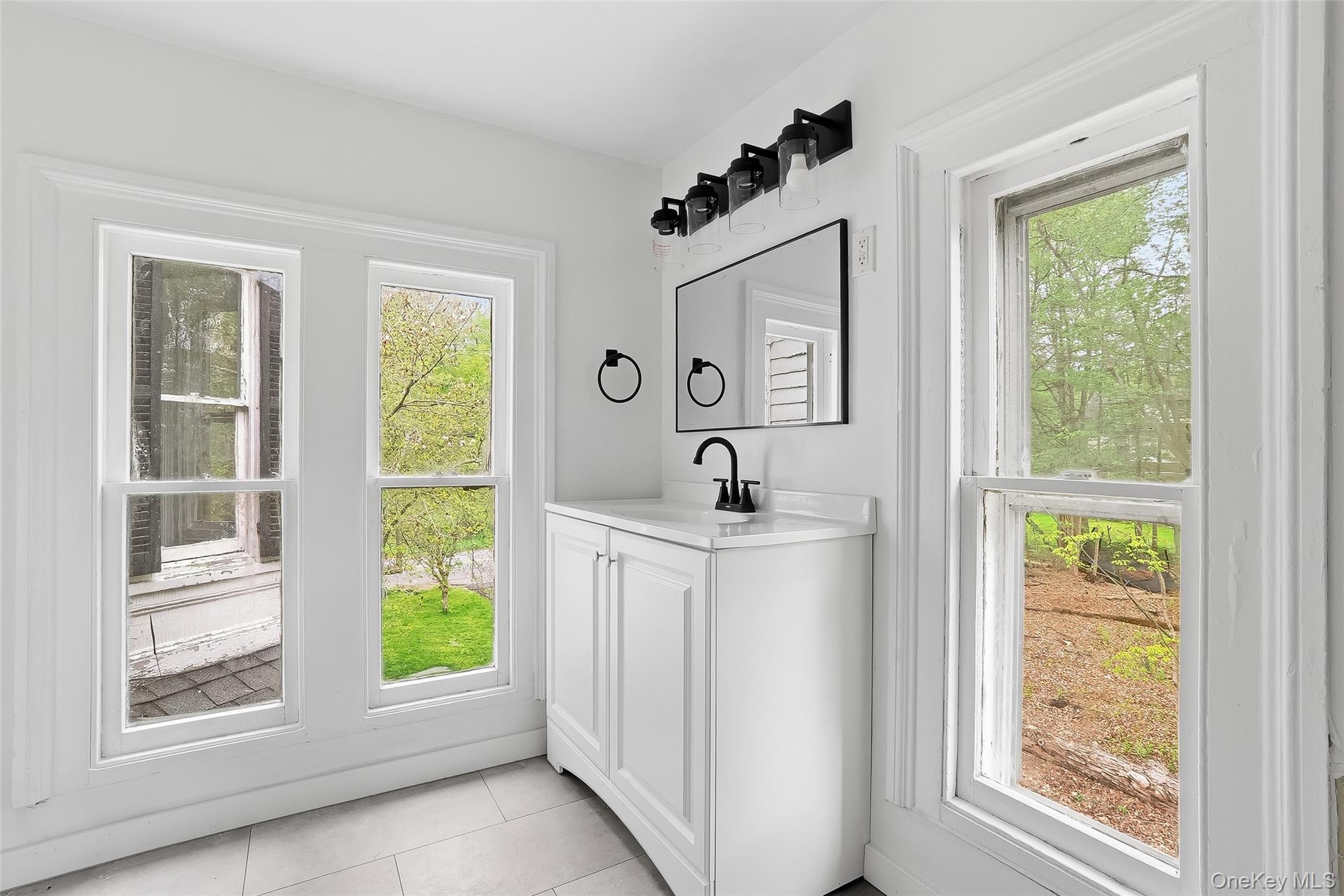 15 Ladentown Road Pomona, NY 10970 - Photo 19 of 23 a view of an entryway with wooden floor and windows