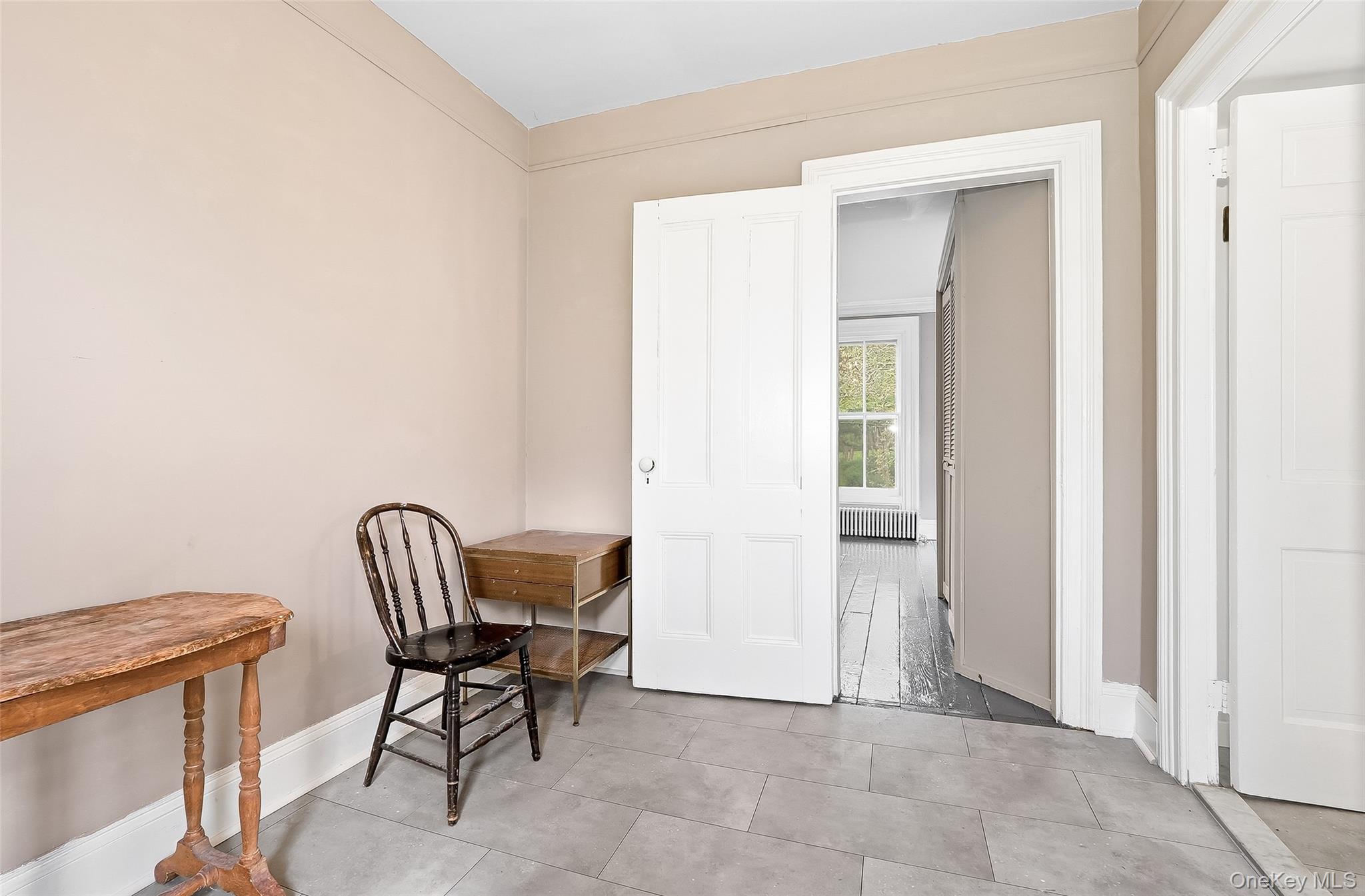 15 Ladentown Road Pomona, NY 10970 - Photo 20 of 23 a view of a hallway with bench and a window