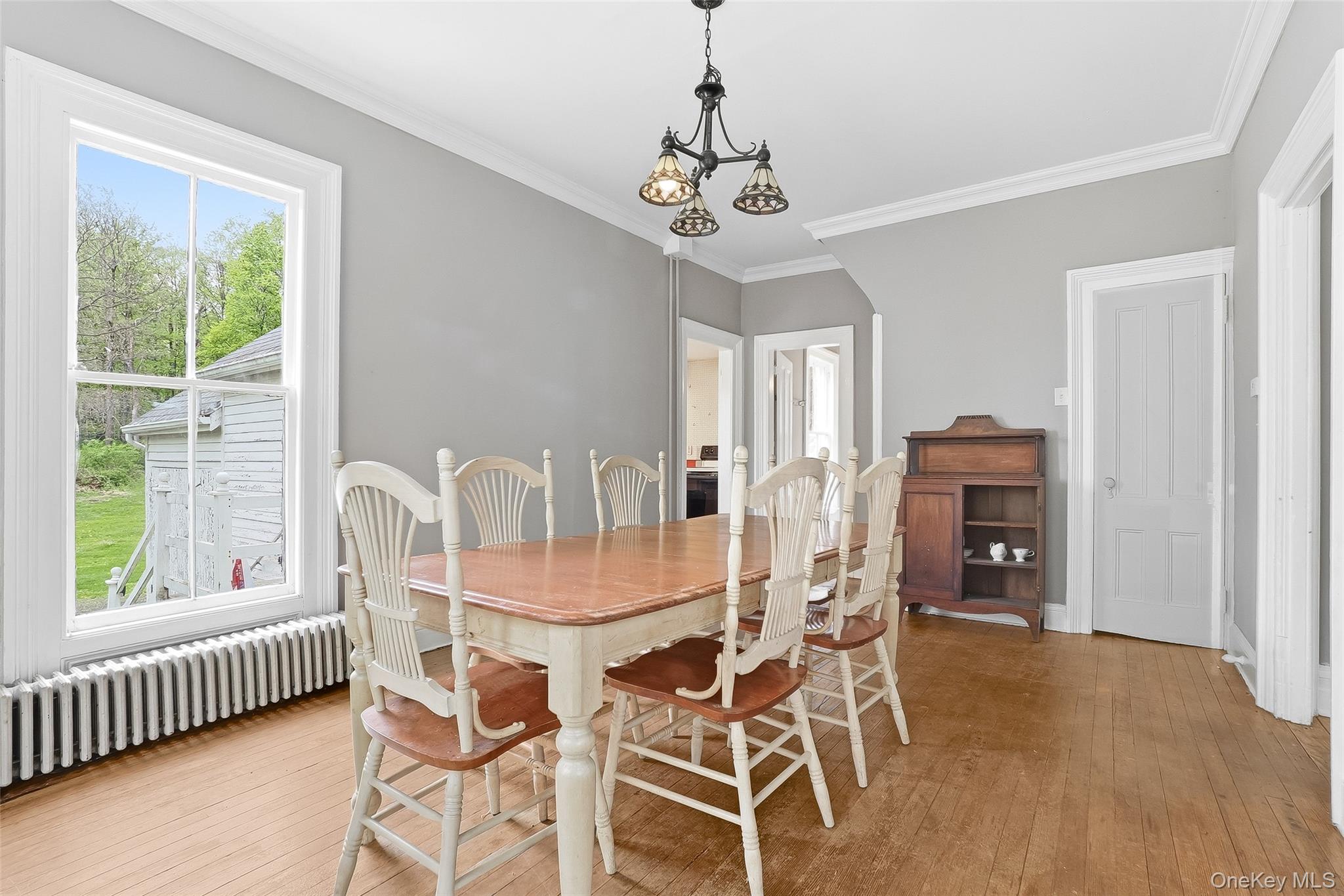 15 Ladentown Road Pomona, NY 10970 - Photo 7 of 23 a view of a dining room with furniture window and wooden floor