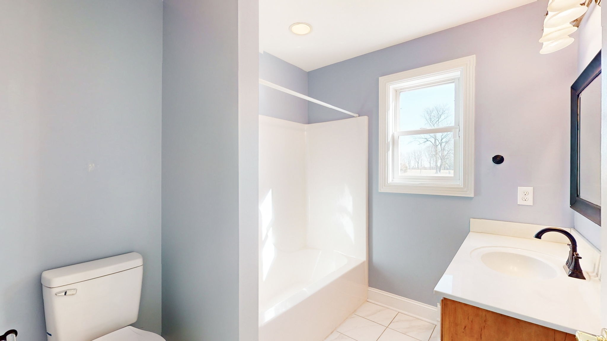 3086 South Rutland Road Mount Juliet, TN 37122 - Photo 20 of 69 a bathroom with a sink toilet and tub
