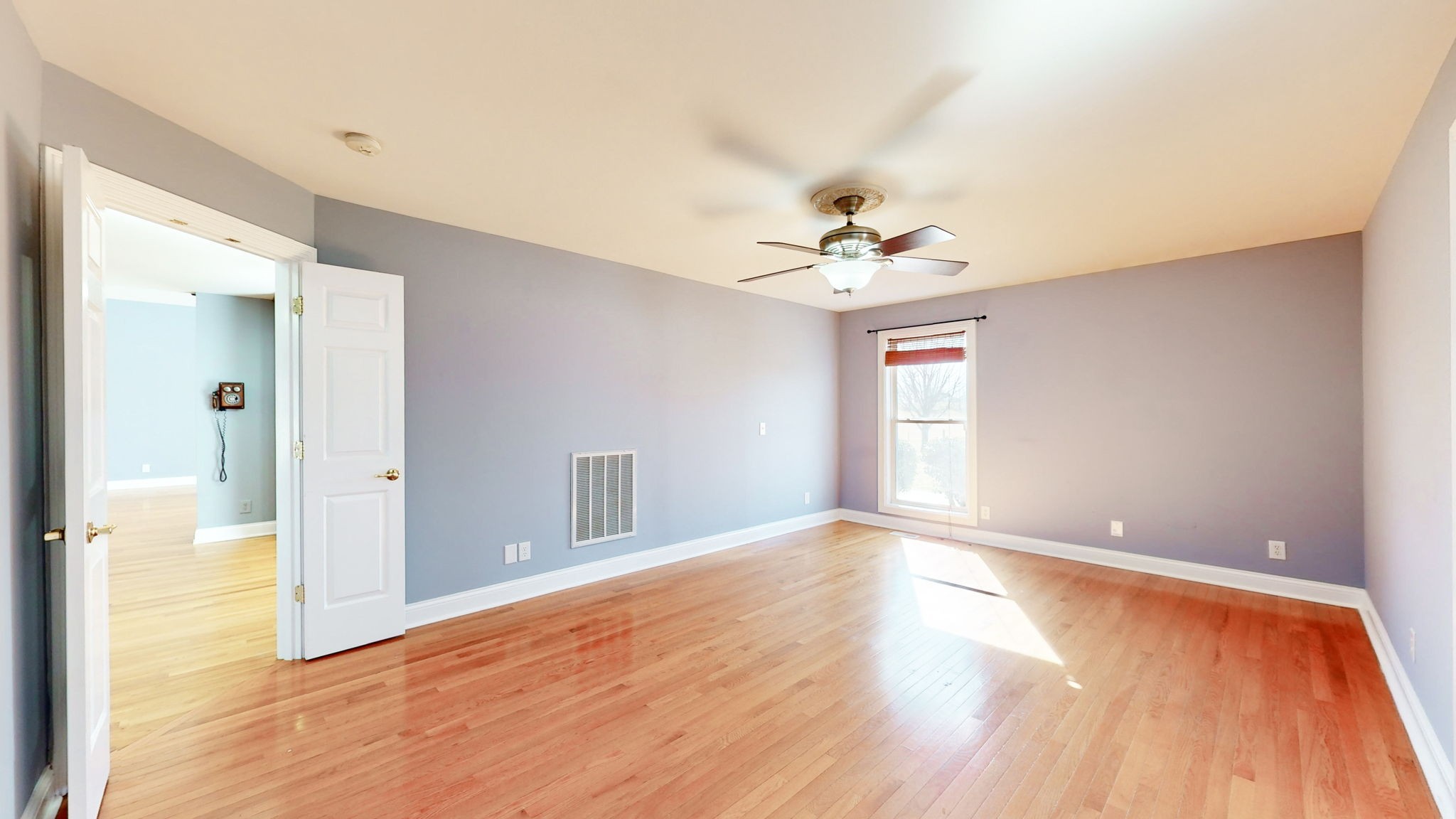 3086 South Rutland Road Mount Juliet, TN 37122 - Photo 29 of 69 a view of an empty room with window and wooden floor