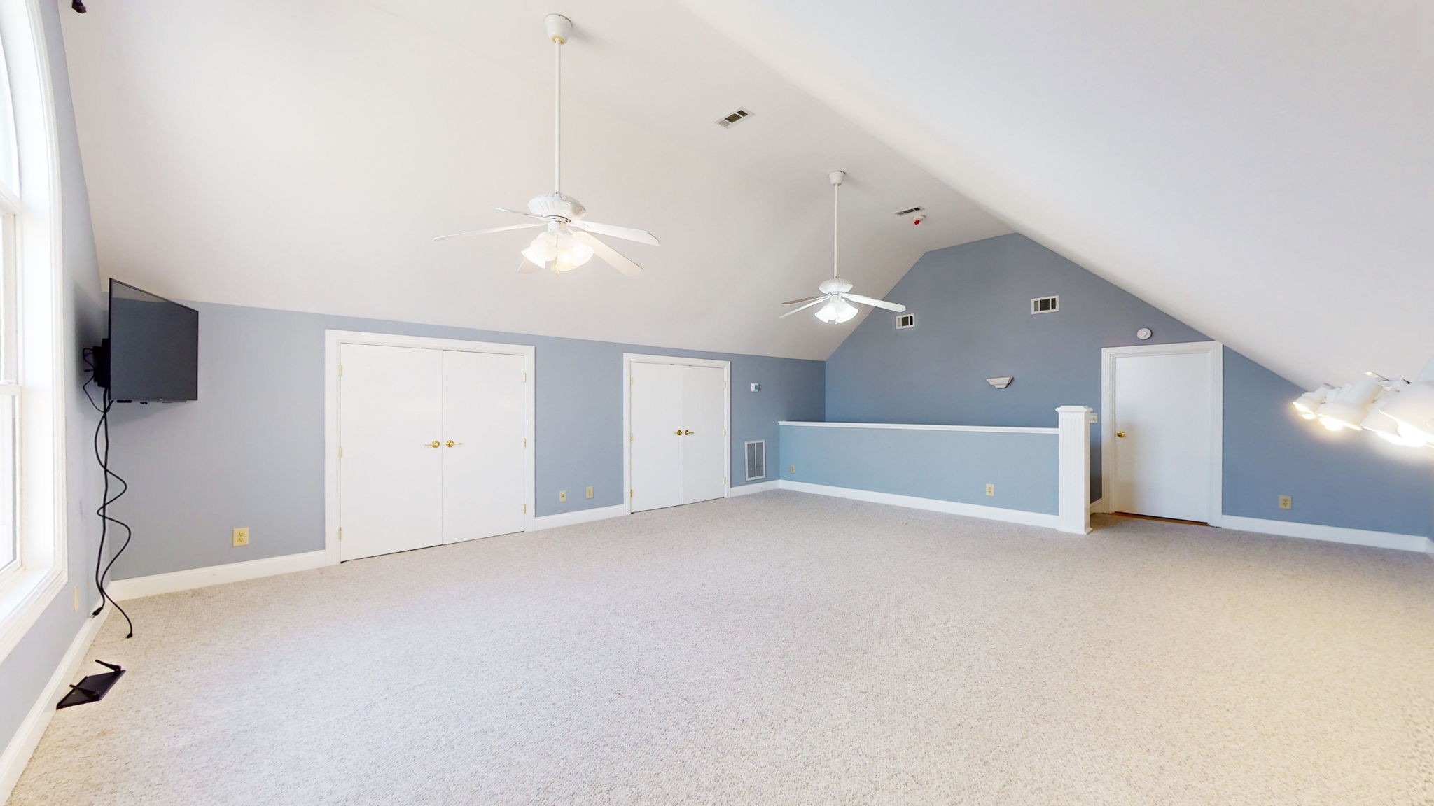 3086 South Rutland Road Mount Juliet, TN 37122 - Photo 38 of 69 an empty room with a empty space and windows