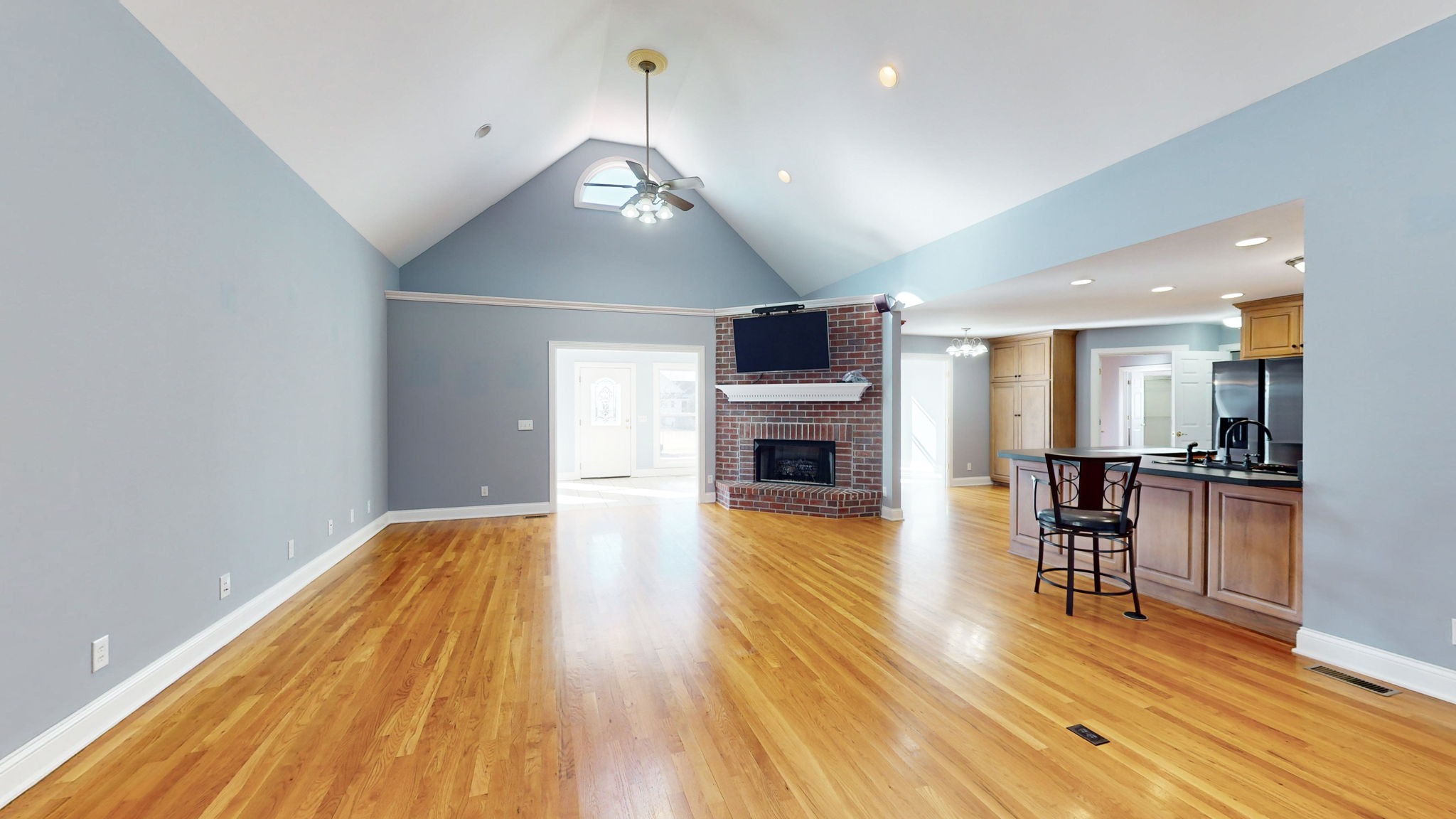 3086 South Rutland Road Mount Juliet, TN 37122 - Photo 4 of 69 a view of a living room and kitchen with wooden floor