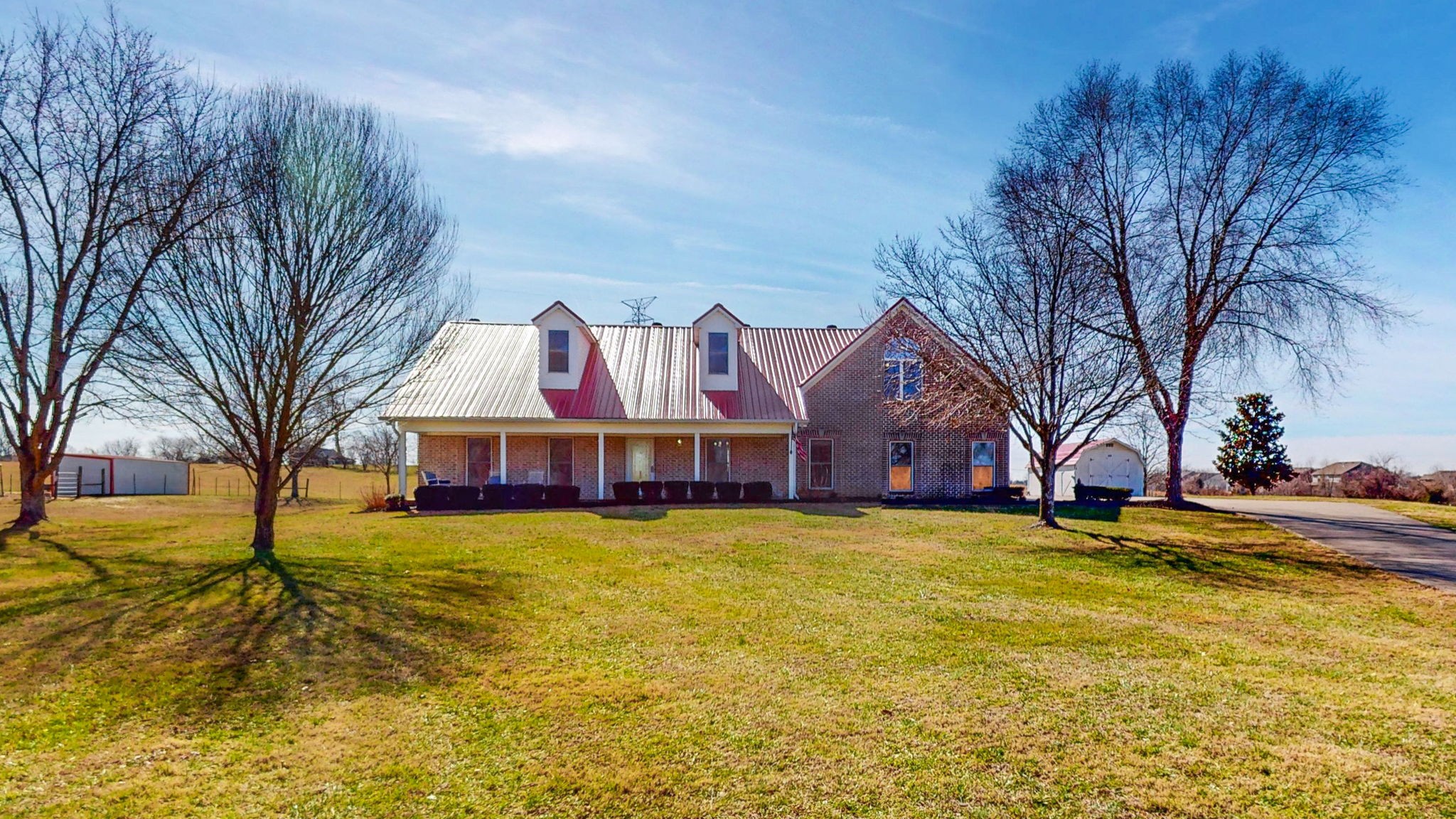 3086 South Rutland Road Mount Juliet, TN 37122 - Photo 47 of 69 a view of a house with a yard and large trees