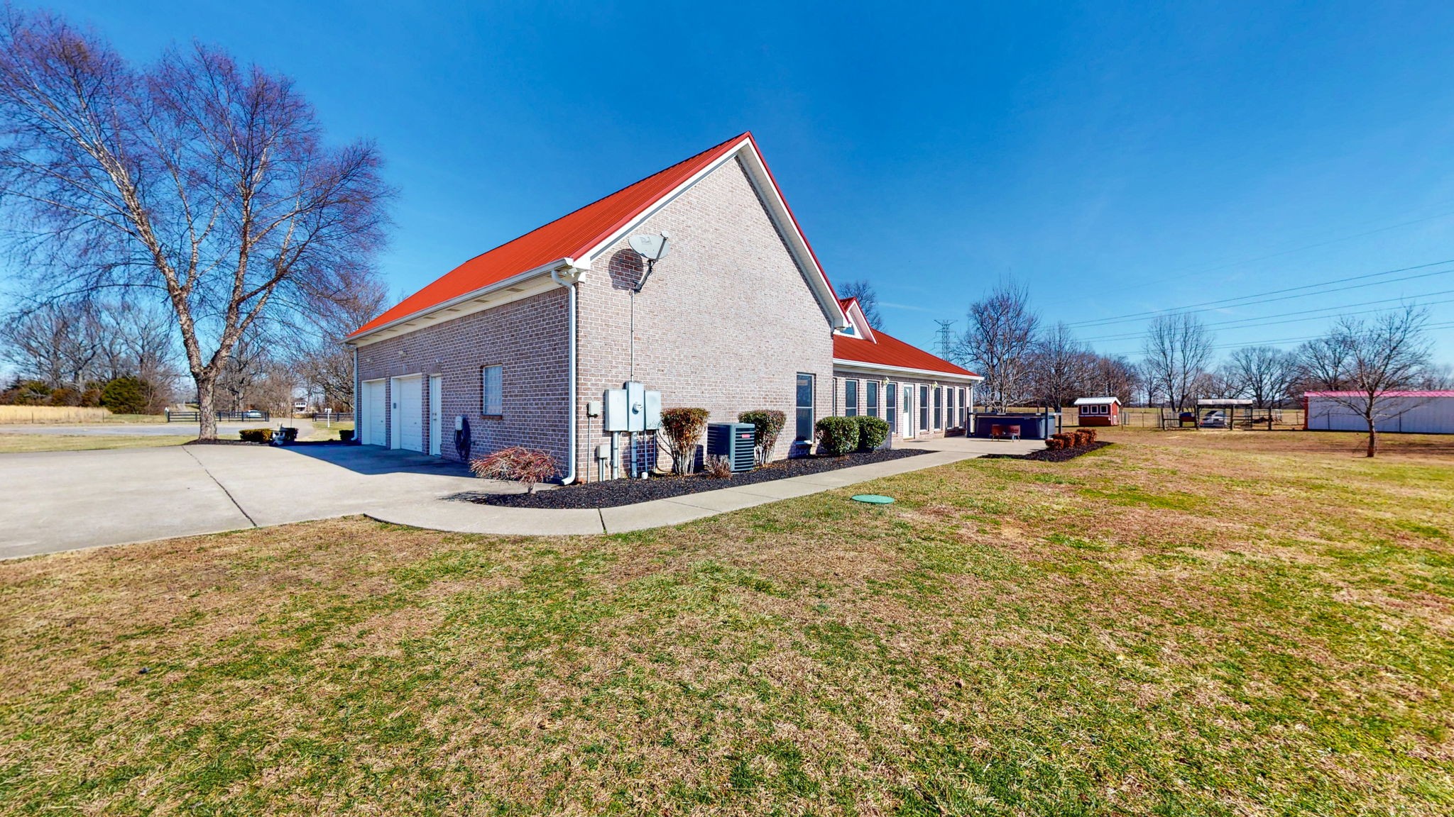 3086 South Rutland Road Mount Juliet, TN 37122 - Photo 51 of 69 a view of a house with a big yard and large trees