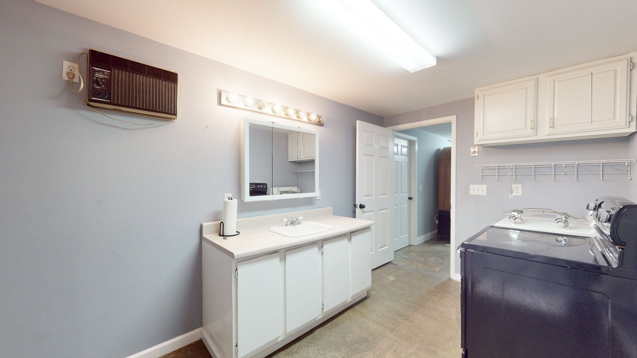 3086 South Rutland Road Mount Juliet, TN 37122 - Photo 63 of 69 a view of a kitchen with a sink and a microwave