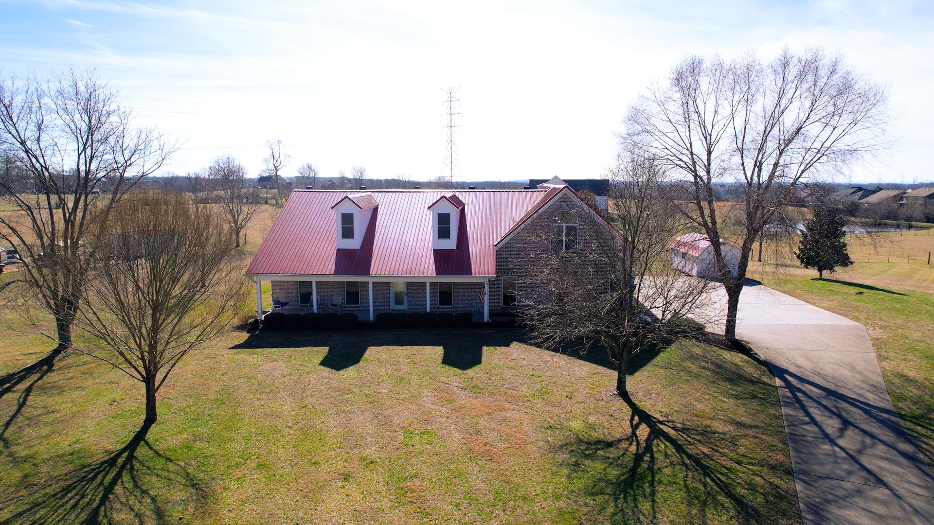 3086 South Rutland Road Mount Juliet, TN 37122 - Photo 65 of 69 a view of a street with a bench in the back yard
