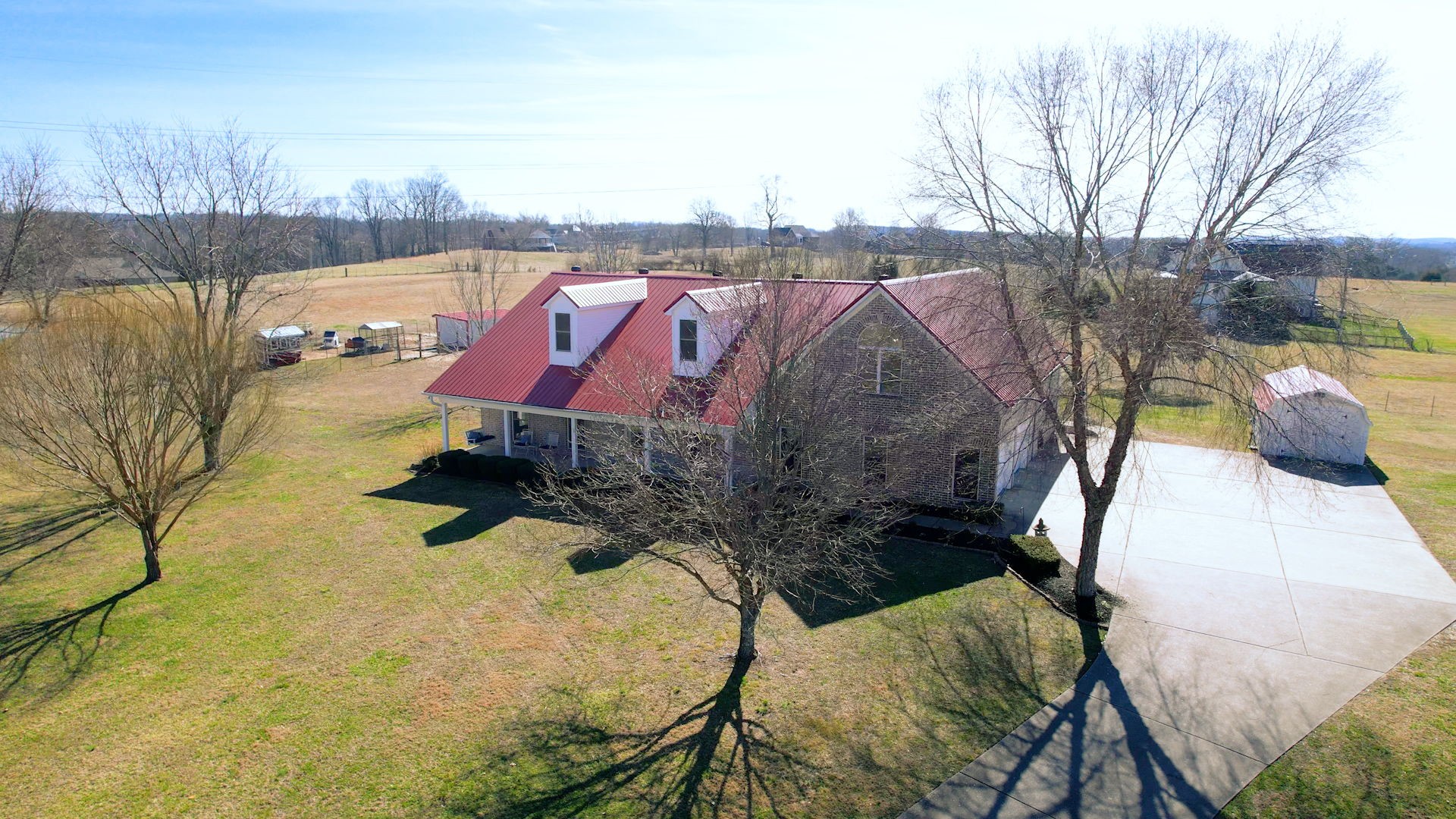 3086 South Rutland Road Mount Juliet, TN 37122 - Photo 69 of 69 a view of a swimming pool with a bench and wooden fence